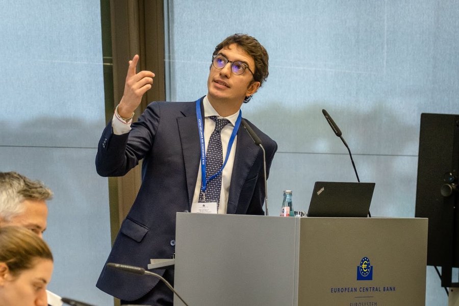 Matteo Leombroni speaking at a conference